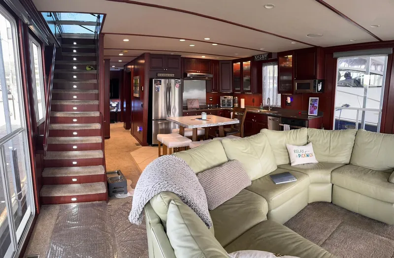 Slide: The Image of Luxurious 2007 Skipperliner 640 interior with modern kitchen and cozy seating area. - 23