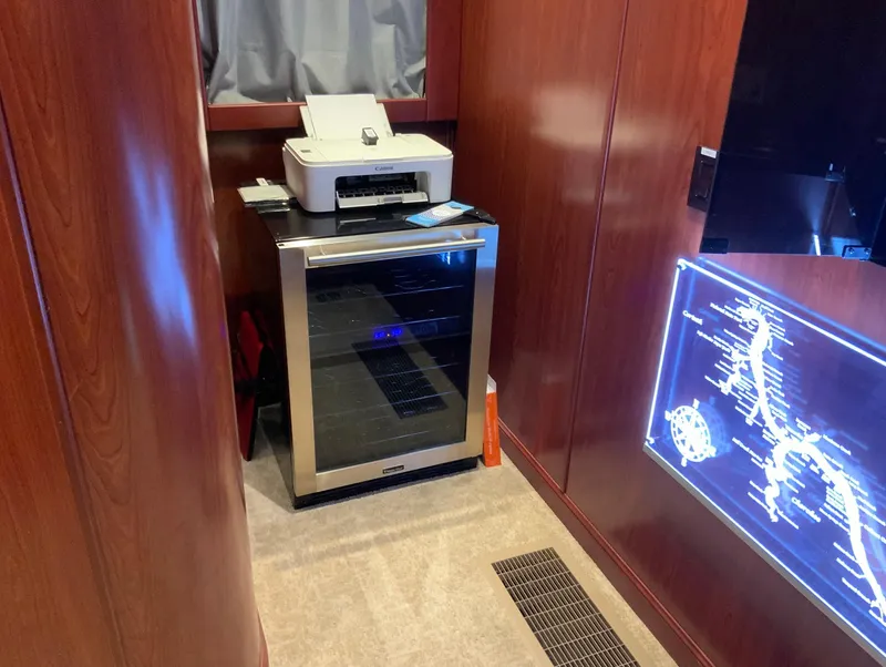 Slide: The Image of Printer and mini fridge in Skipperliner 640 yacht interior, 2007 model. - 40