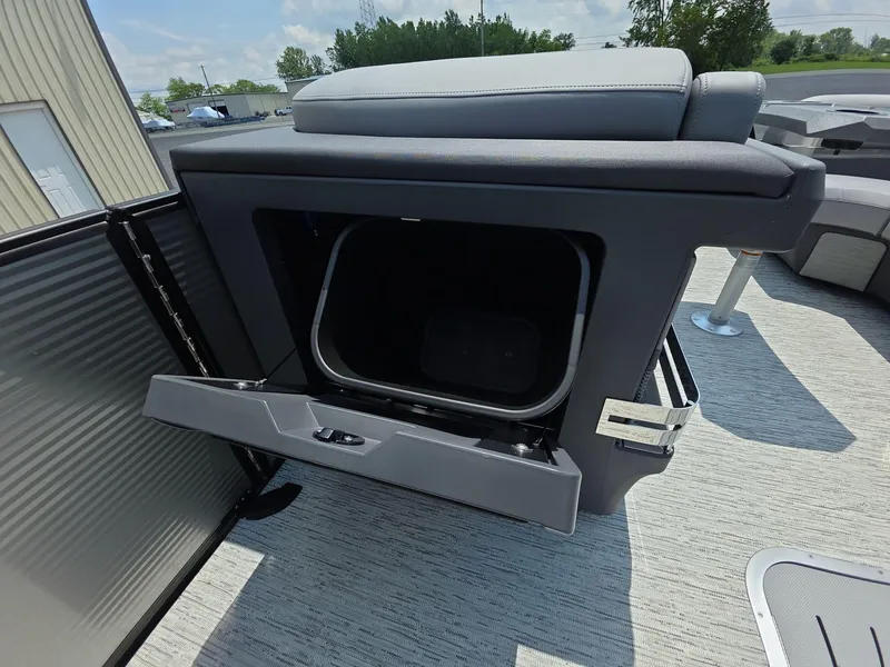 Slide: The Image of Open storage compartment on 2025 Bennington M Line boat, showcasing modern design and functionality. - 11
