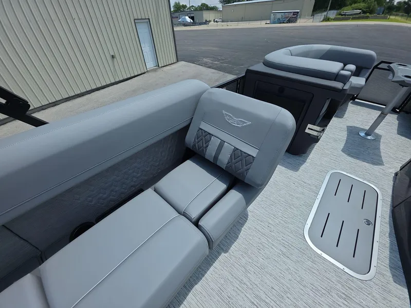 Slide: The Image of 2025 Bennington M Line boat interior with gray seating and modern design. - 14