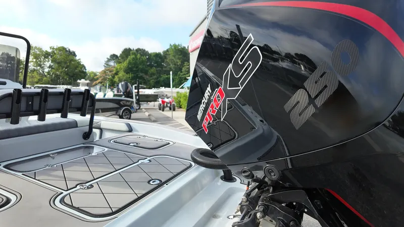 Slide: The Image of 2025 ALK2 Powerboats 21 BHX with powerful engine, sleek design, and spacious deck. - 14