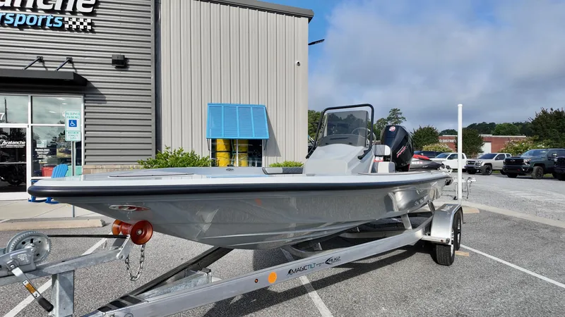 Slide: The Image of 2025 ALK2 Powerboats 21 BHX on trailer outside dealership, showcasing sleek design. - 17