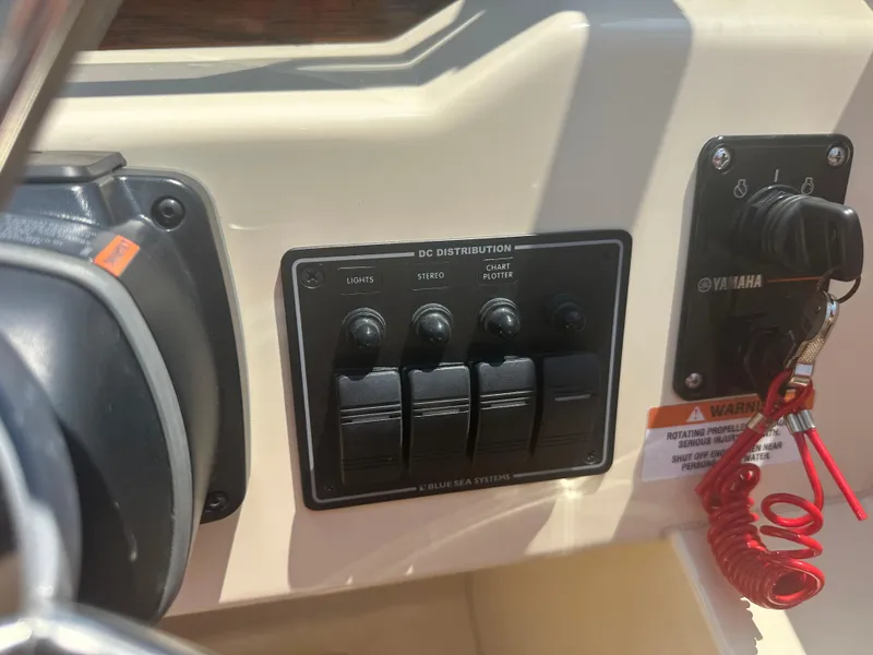Slide: The Image of Control panel of a 2018 Rossiter 20 Coastal Cruiser boat with Yamaha ignition. - 8