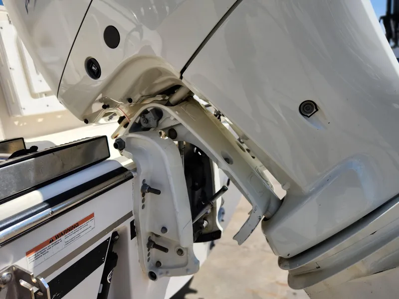 Slide: The Image of Close-up of a 2005 Pursuit 3070 Offshore Center Console boat engine mount. - 18