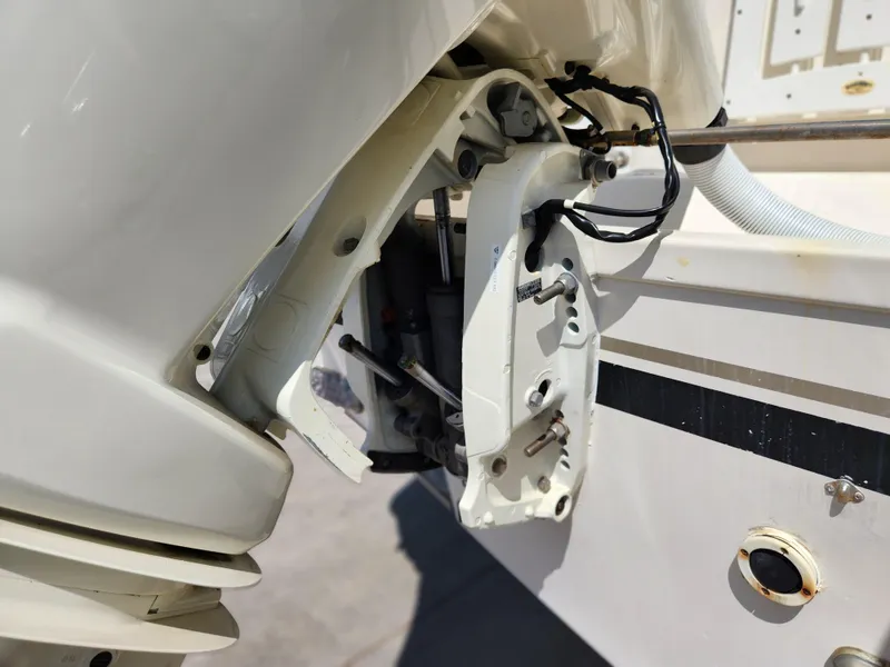 Slide: The Image of 2005 Pursuit 3070 Offshore Center Console boat engine mount detail. - 19