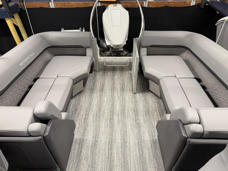 Slide: The Image of 2025 Bennington M Line boat interior with gray seating and modern design. - 4