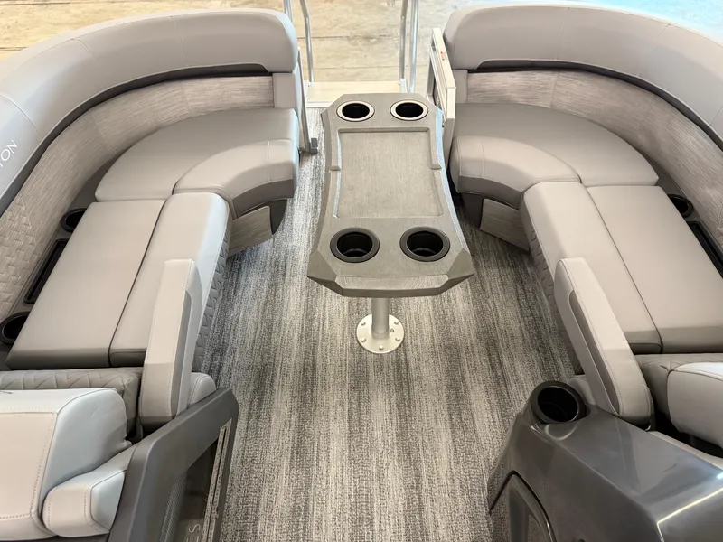 Slide: The Image of Luxurious 2025 Bennington M Line boat interior with plush seating and central table. - 6