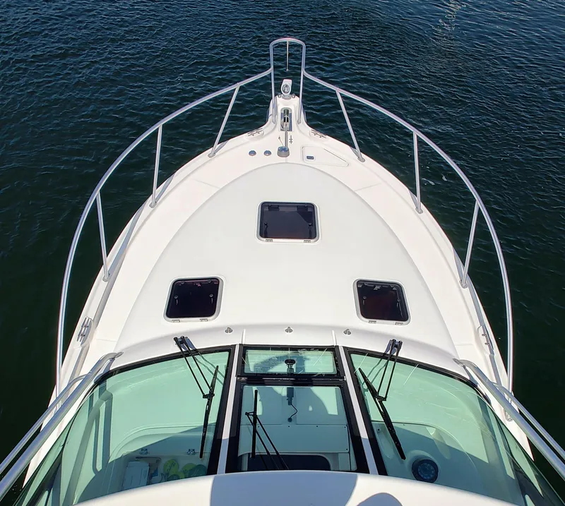 Slide: The Image of 2008 Tiara Yachts 3200 Open boat deck view on water. - 11