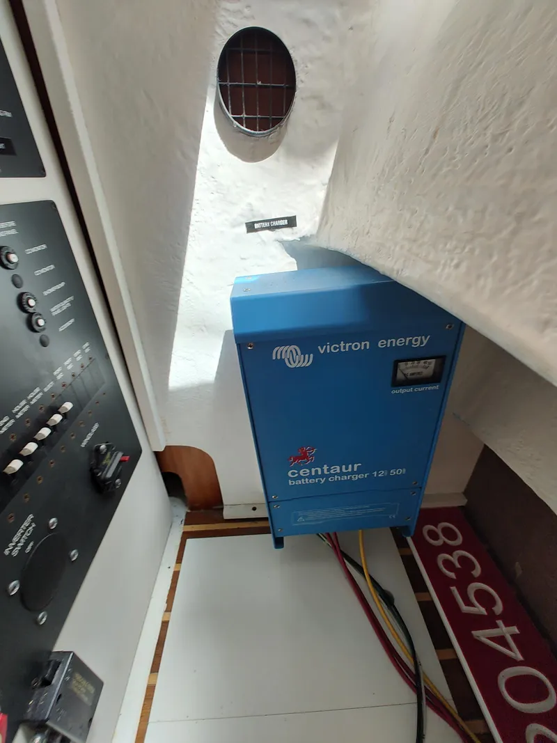 Slide: The Image of Victron Energy charger in 2008 Tiara Yachts 3200 Open, marine electrical setup. - 34