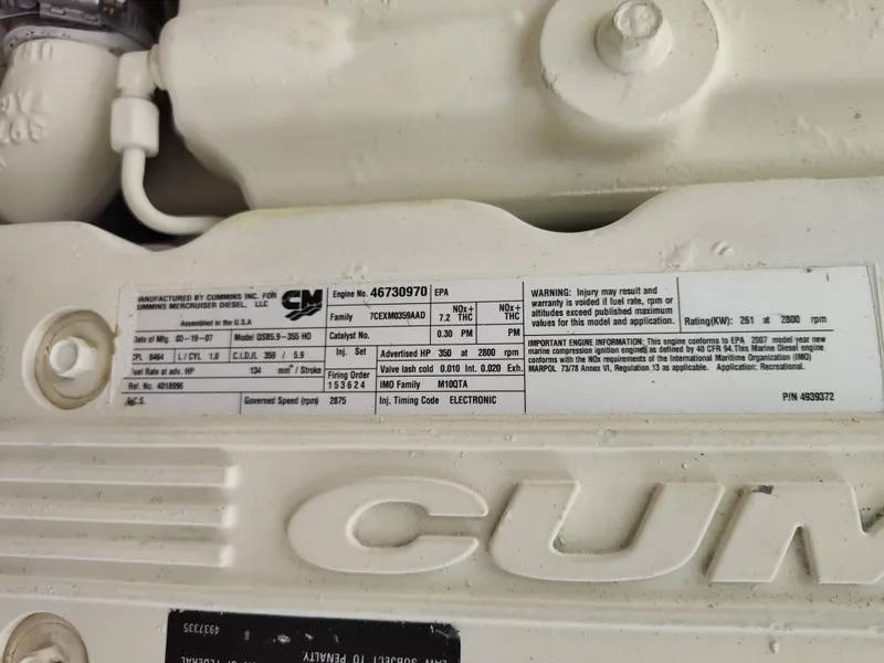 Slide: The Image of Engine label on a 2008 Tiara Yachts 3200 Open, displaying specifications and warnings. - 38