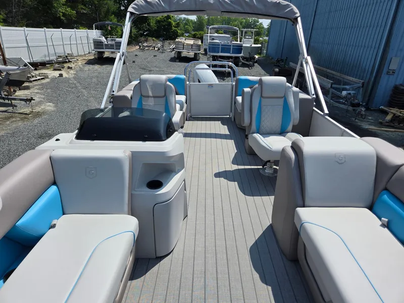 Slide: The Image of 2026 Godfrey SWEETWATER 2286 SB pontoon boat with spacious seating and modern design. - 10