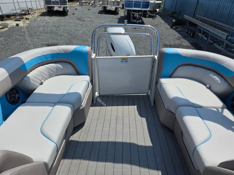 Slide: The Image of 2026 Godfrey SWEETWATER 2286 SB pontoon boat interior with plush seating and modern design. - 22