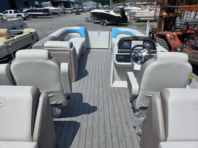 Slide: The Image of 2026 Godfrey SWEETWATER 2286 SB pontoon boat with spacious seating and modern dashboard. - 28