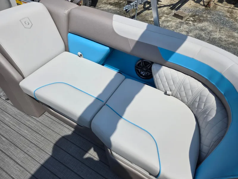 Slide: The Image of 2026 Godfrey SWEETWATER 2286 SB boat seating with blue and white upholstery. - 30
