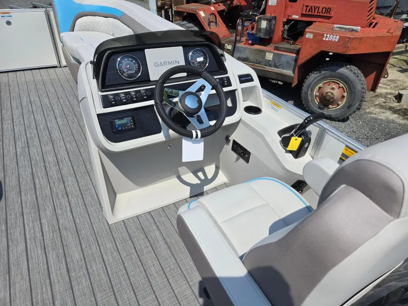 Slide: The Image of Cockpit of 2026 Godfrey SWEETWATER 2286 SB boat with Garmin navigation system. - 32