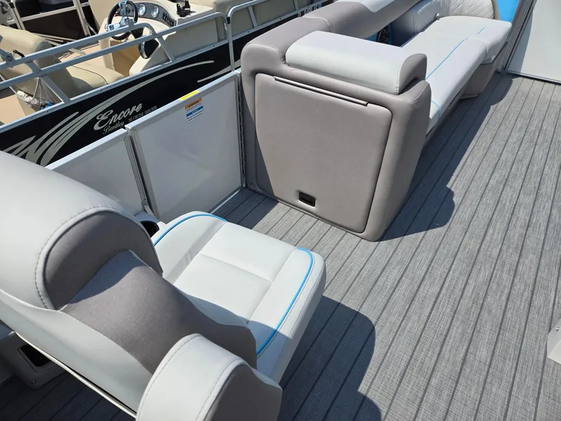 Slide: The Image of 2026 Godfrey SWEETWATER 2286 SB pontoon boat interior with gray seating and flooring. - 33