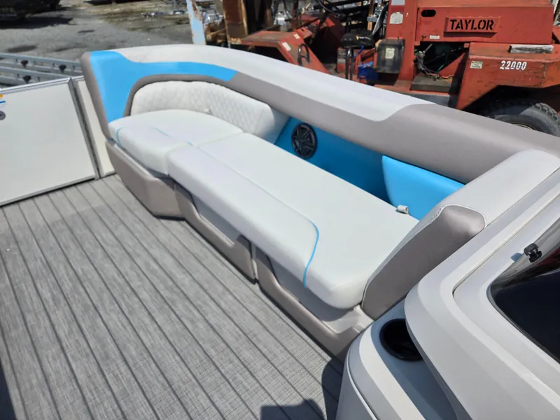 Slide: The Image of 2026 Godfrey SWEETWATER 2286 SB boat interior with blue and white seating. - 35