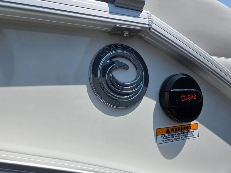 Slide: The Image of 2026 Godfrey SWEETWATER 2286 SB boat with Coastal emblem and gas cap. - 39