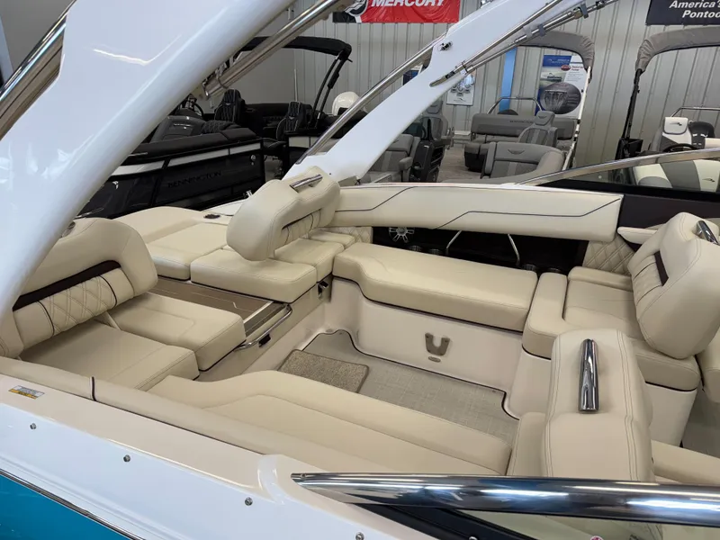 Slide: The Image of 2025 Regal LS4 boat interior with luxurious beige seating and modern design. - 5