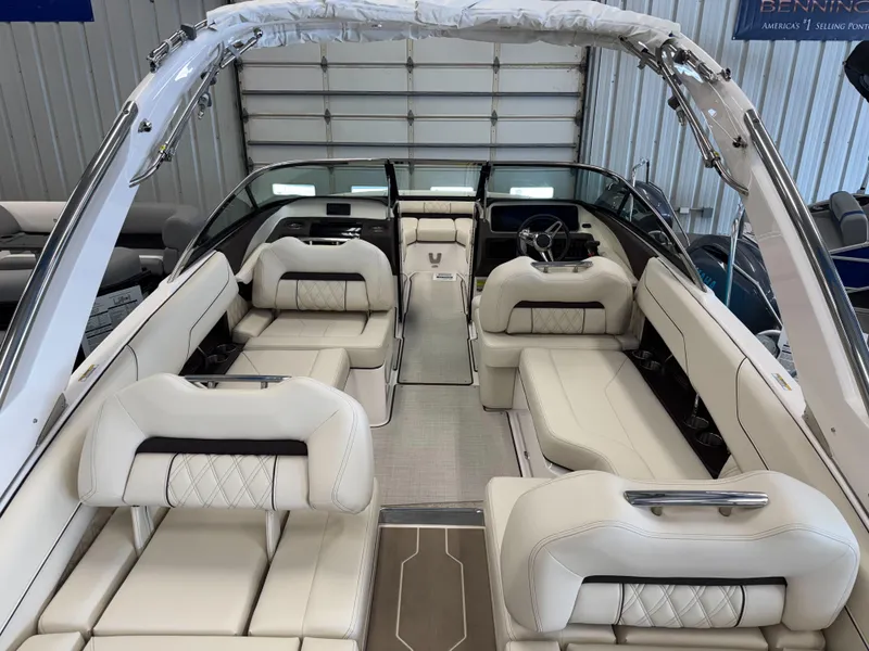 Slide: The Image of Luxurious 2025 Regal LS4 boat interior with plush white seating and modern design. - 9
