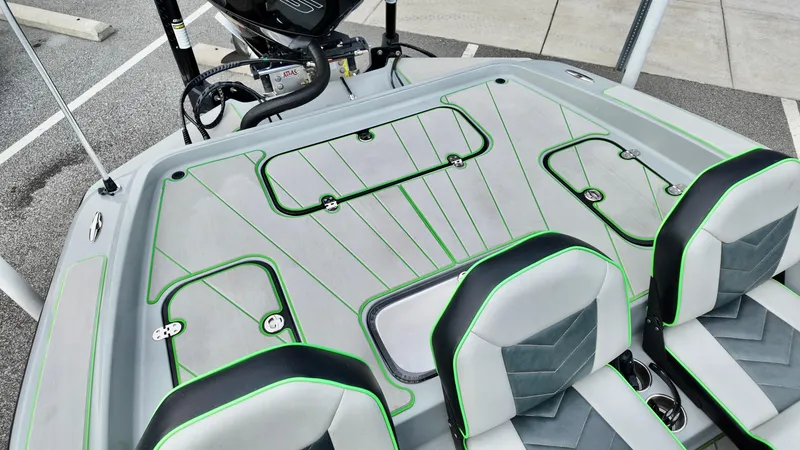 Slide: The Image of 2025 ALK2 Powerboats 21 BHX interior with sleek seating and modern design accents. - 17