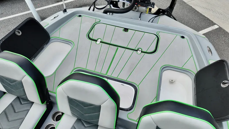 Slide: The Image of 2025 ALK2 Powerboats 21 BHX interior with modern seating and sleek design. - 20