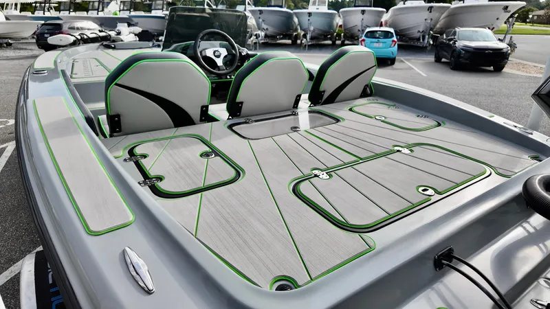 Slide: The Image of 2025 ALK2 Powerboats 21 BHX with sleek deck design and modern seating. - 6