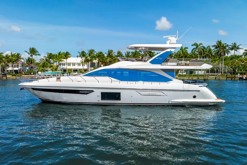 Slide: The Image of Azimut Fly 72 yacht, 2021 model, cruising on a sunny day with palm trees in the background. - 15