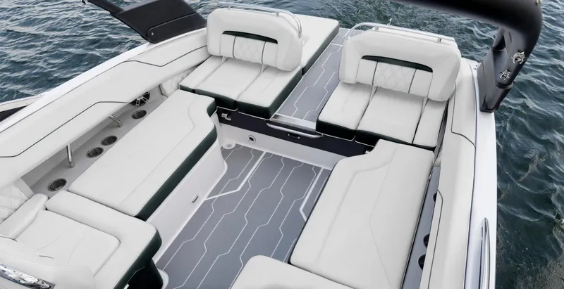 Slide: The Image of Luxurious 2025 Regal LS4 boat interior with spacious white seating and sleek design on the water. - 3