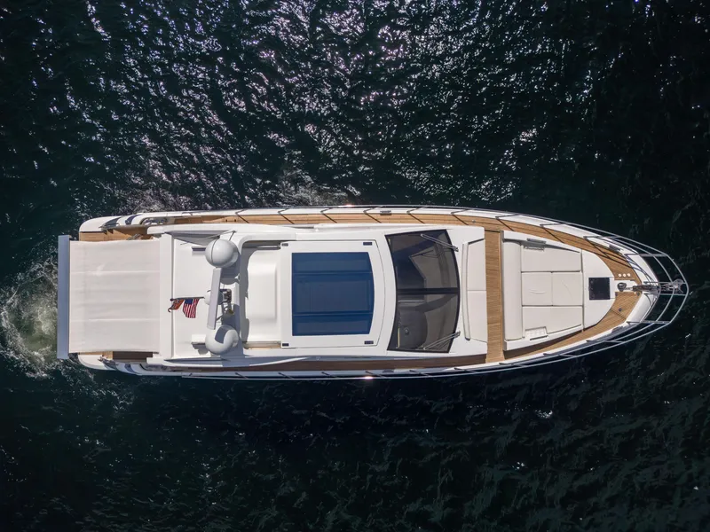 Slide: The Image of Overhead view of 2016 Azimut 55S yacht cruising on water. - 10