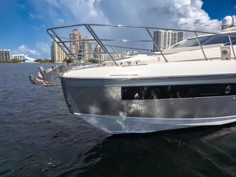 Slide: The Image of 2016 Azimut 55S yacht on water with city skyline in background. - 15