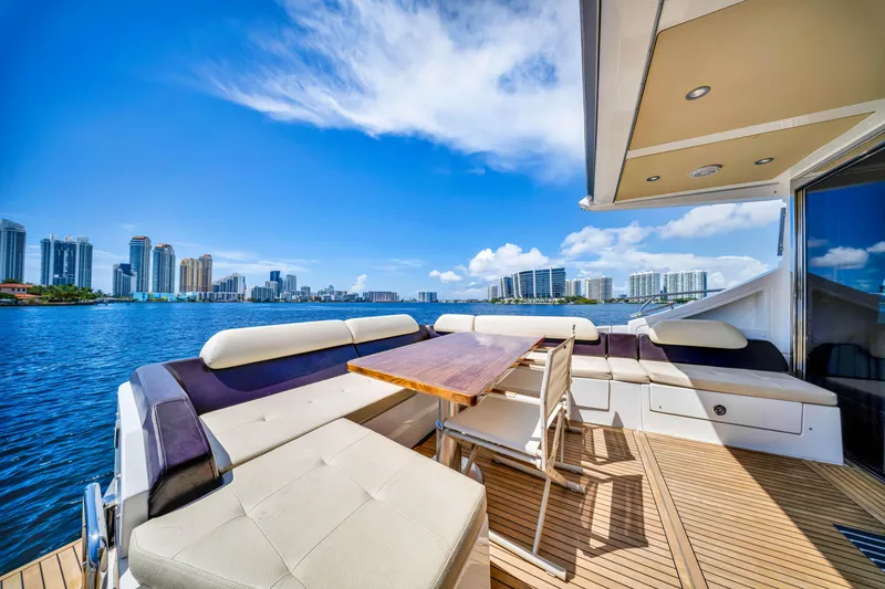 Slide: The Image of Luxurious 2016 Azimut 55S yacht deck with city skyline and waterfront view. - 22