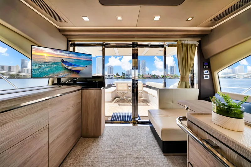 Slide: The Image of Luxurious interior of 2016 Azimut 55S yacht with modern decor and waterfront view. - 28