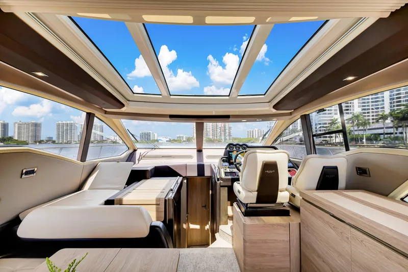 Slide: The Image of Luxurious interior of a 2016 Azimut 55S yacht with panoramic windows and modern design. - 32