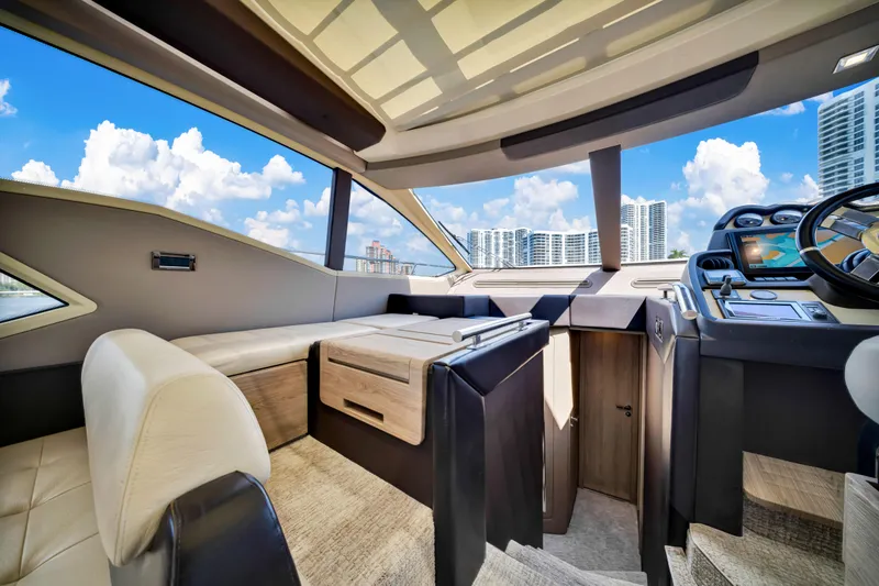 Slide: The Image of Luxurious interior of 2016 Azimut 55S yacht with modern design and cityscape view. - 34