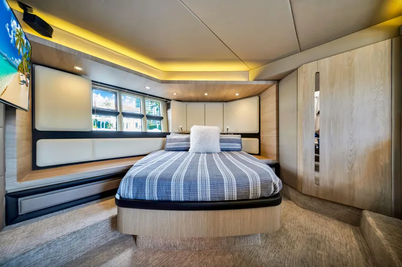 Slide: The Image of Luxurious bedroom interior of 2016 Azimut 55S yacht with modern design and ambient lighting. - 46