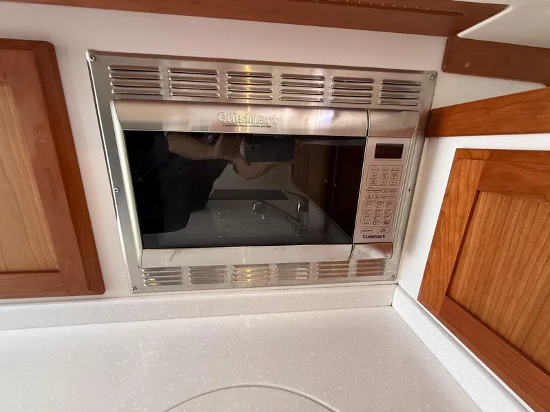 Slide: The Image of Built-in Cuisinart microwave in 2019 Back Cove Downeast boat kitchen. - 38