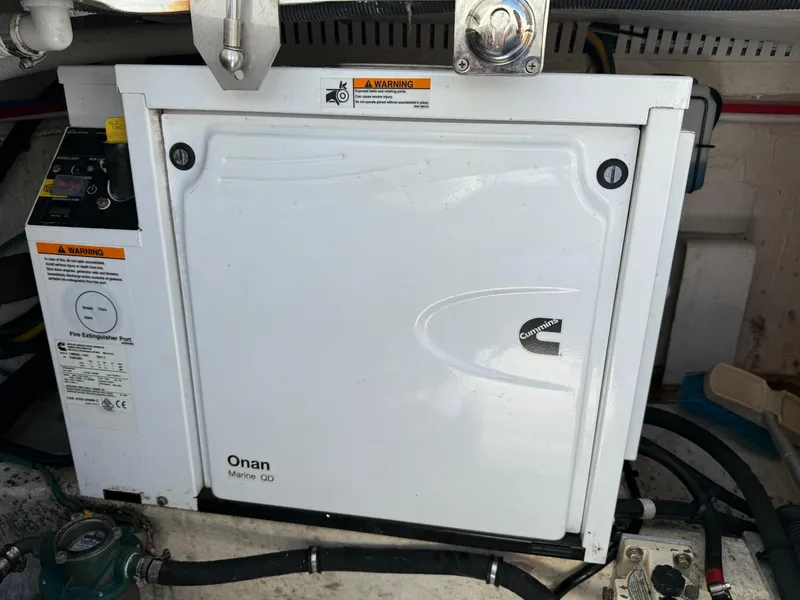 Slide: The Image of 2019 Back Cove Downeast boat with Onan Marine QD generator in engine compartment. - 48