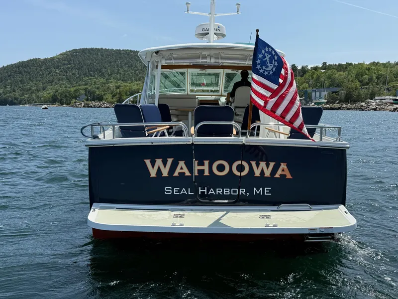 Slide: The Image of 2019 Back Cove Downeast boat "Wahoowa" in Seal Harbor, ME, with American flag. - 7