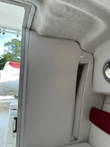 Slide: The Image of Interior view of a 1998 Boston Whaler 23 Conquest boat cabin. - 11