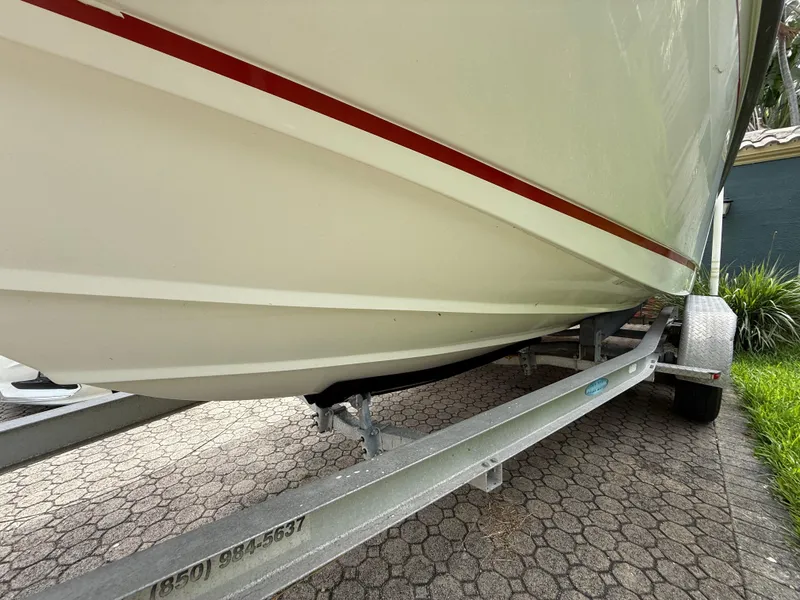Slide: The Image of 1998 Boston Whaler 23 Conquest boat on trailer, side view. - 5