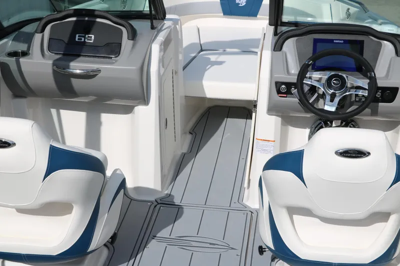 Slide: The Image of 2025 Chaparral 21 Surf boat interior with modern dashboard and seating. - 14