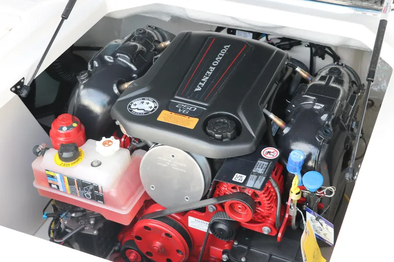 Slide: The Image of Engine compartment of 2025 Chaparral 21 Surf boat with Volvo Penta engine. - 25