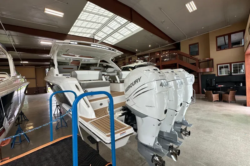 Slide: The Image of 2022 Tiara Yachts 38 LX with Mercury engines in showroom. - 17