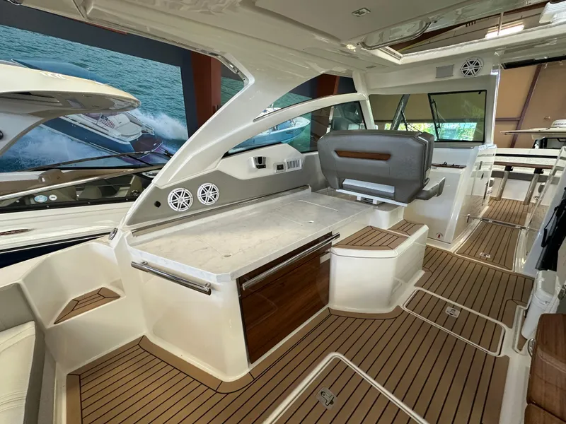 Slide: The Image of 2022 Tiara Yachts 38 LX interior with sleek design and luxurious seating. - 32