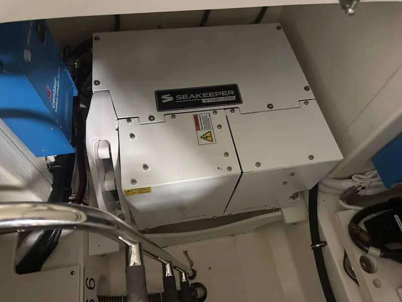 Slide: The Image of Seakeeper system in 2022 Tiara Yachts 38 LX engine room, enhancing stability and performance. - 37