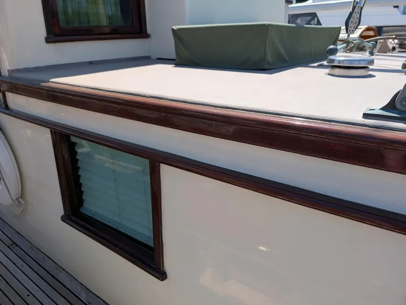 Slide: The Image of Classic 1936 Motorsailer with wooden trim and deck details. - 13