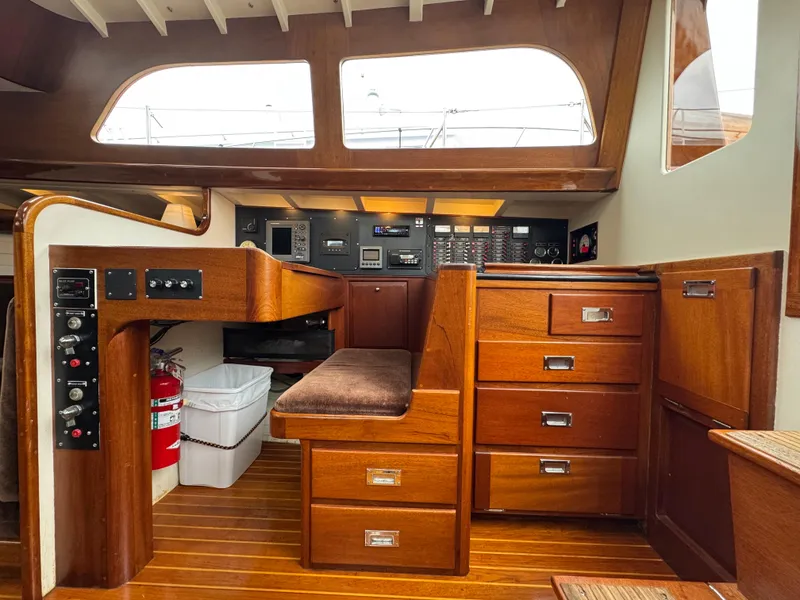 Slide: The Image of Interior of 1970 Custom Sparkman and Stephens yacht with wooden cabinetry and navigation equipment. - 5