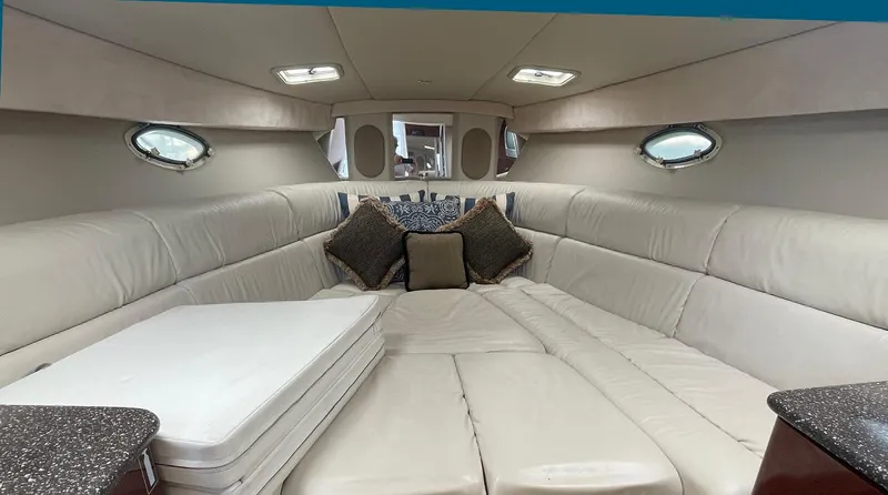 Slide: The Image of Luxurious interior of 2003 Formula 370 SS boat with plush seating and elegant decor. - 7
