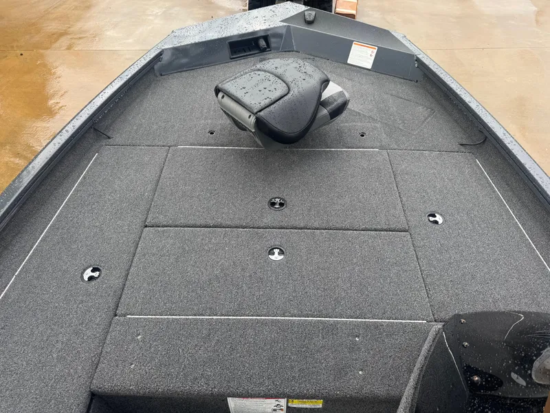 Slide: The Image of 2025 Crestliner XF 179 boat interior with dual seats and navigation system. - 5